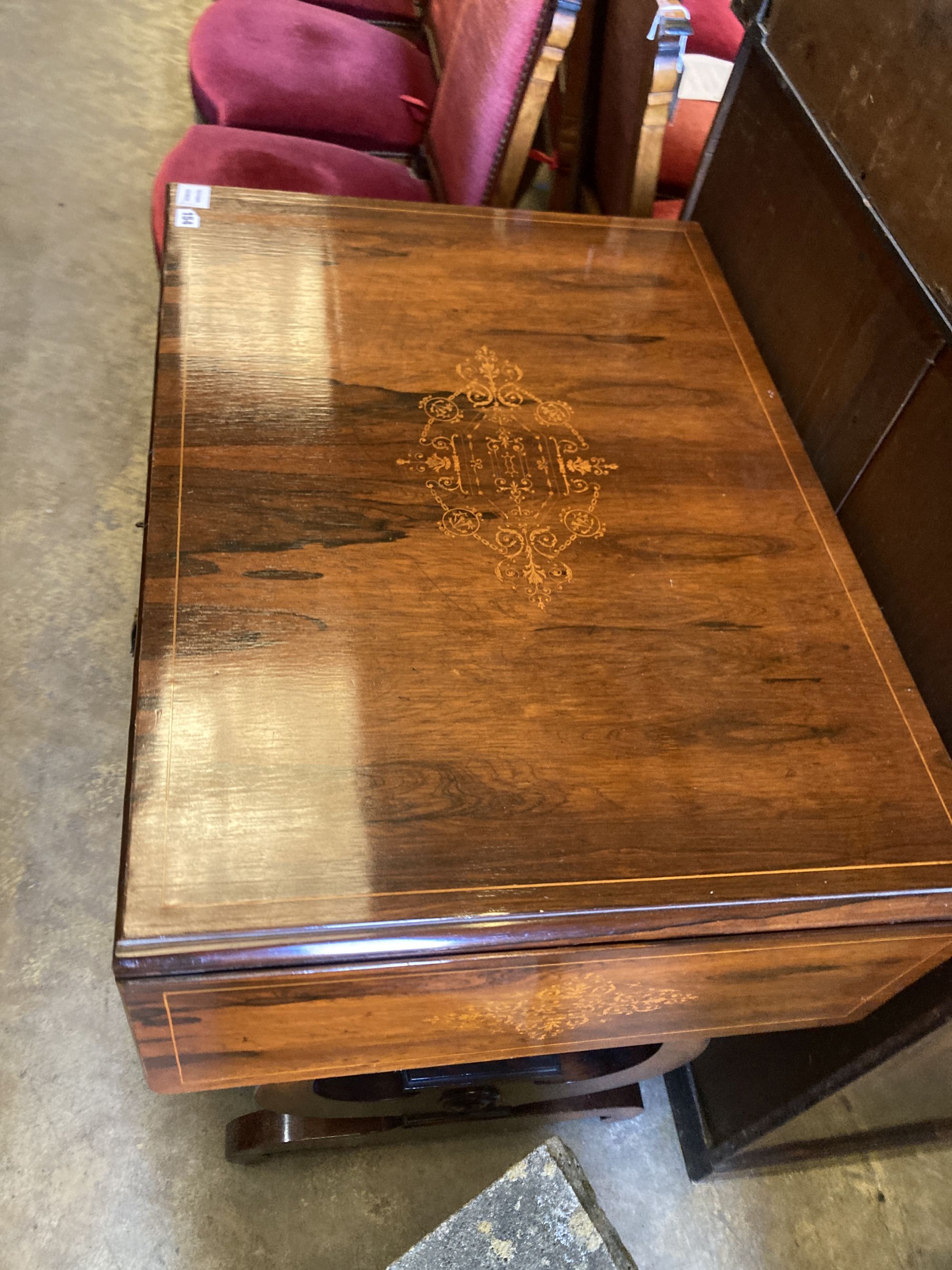 A 19th century French marquetry inlaid rosewood sofa table, width 84cm, depth 60cm, height 77cm